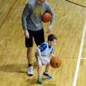 Nick dribbles the ball